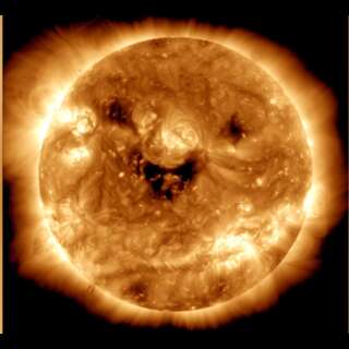 The sun. Solar surface movement and flares make a happy but omnimous face appear.