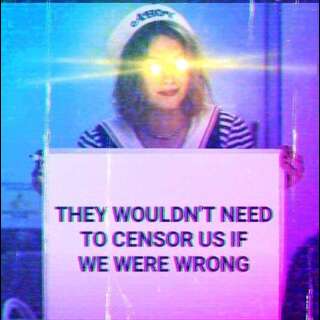 Ahoy Girl, with glowing golden eyes, holding a sign. Caption: They wouldn't need to censor us if we were wrong.